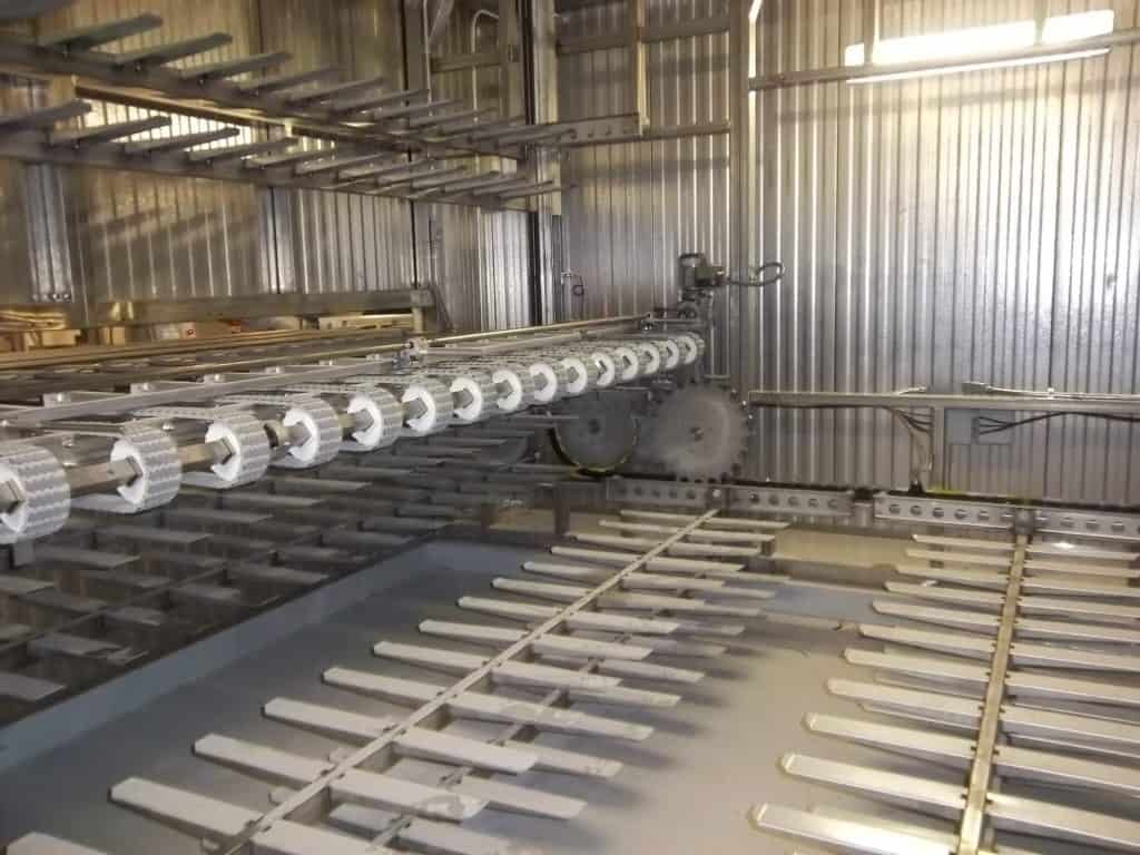 Roller conveyor and pan handling section inside a bakery plant